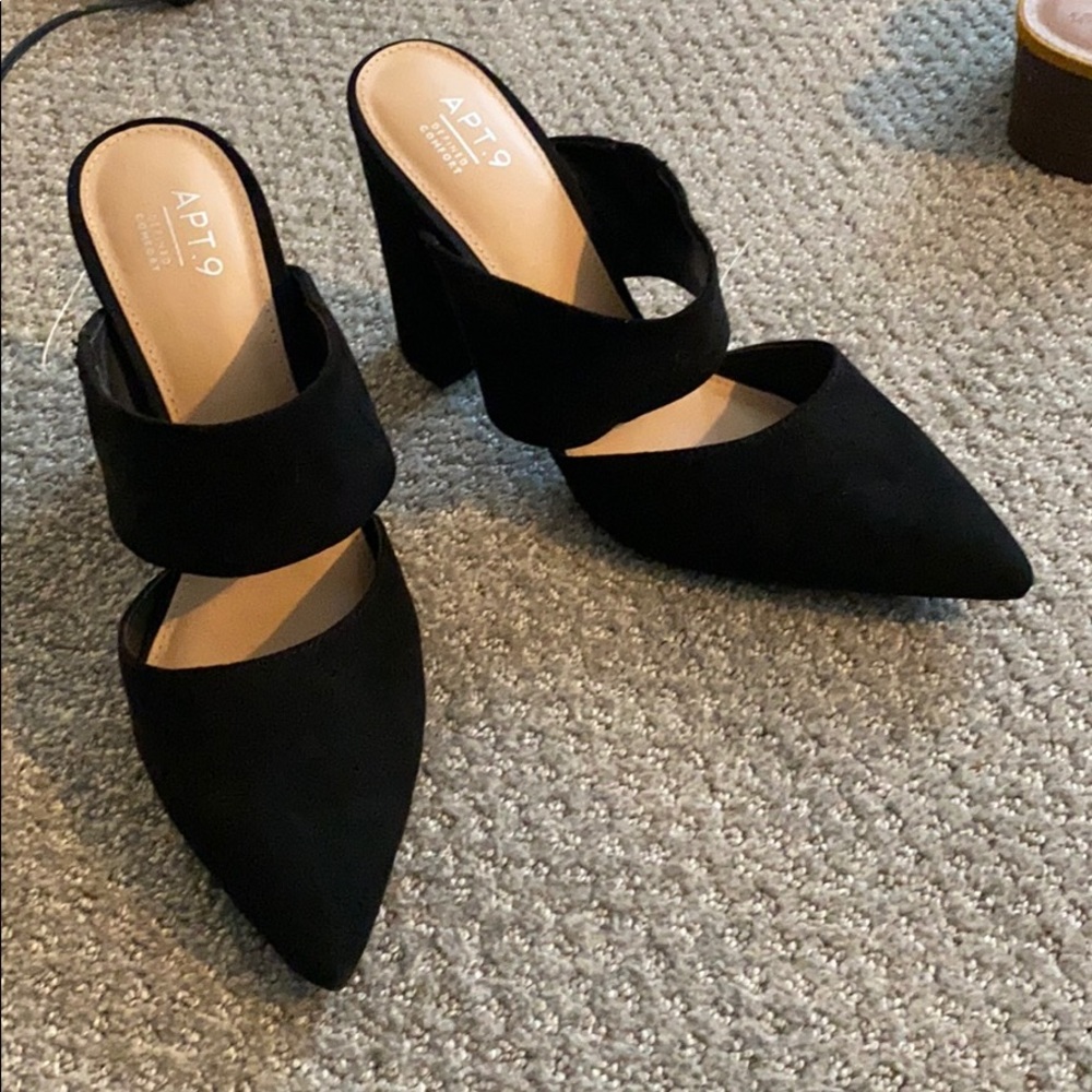 Black heeled shoe. Never worn.